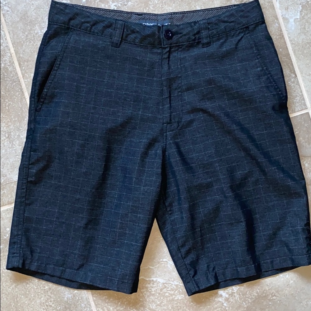 O’Neill shorts. Size 31. Black & white plaid EUC.